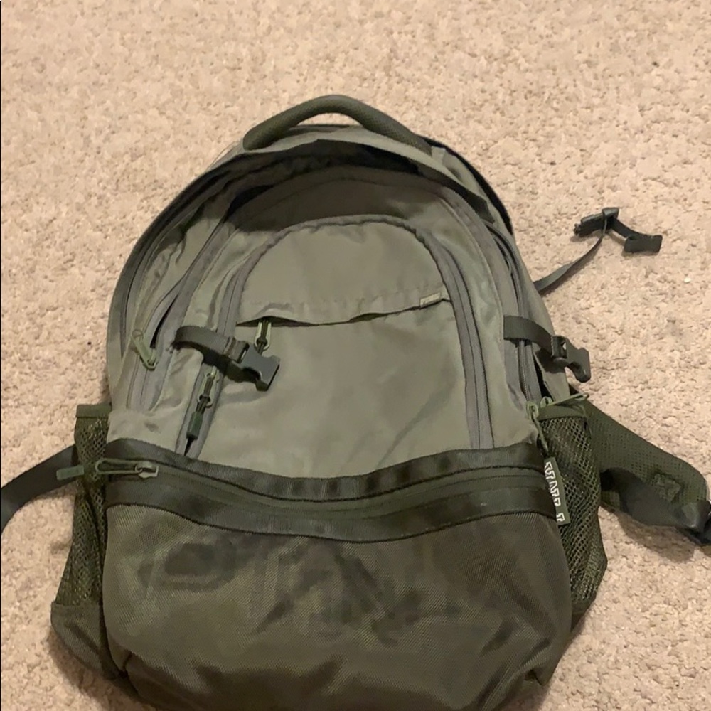PINK backpack with several compartments.